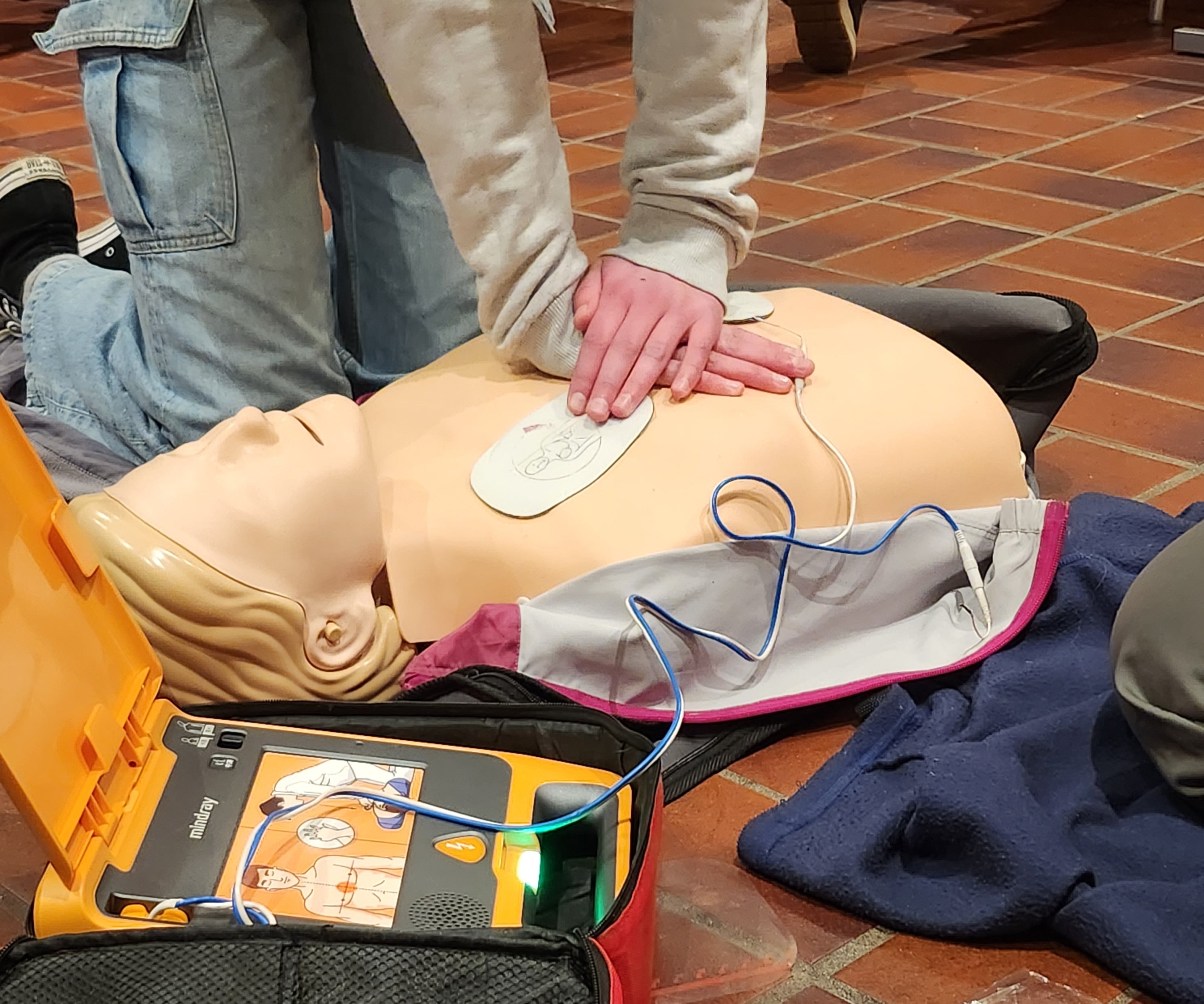 CPR course - have straight arms and sturdy legs while doing chest compressions
